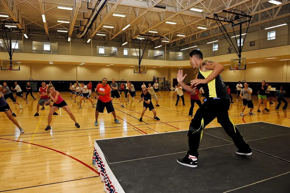A Zumba class in a gym